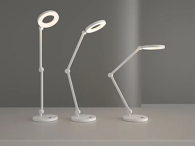 Modern White Desk Lamps with Adjustable Arms and Different Light Head Designs on Table 3d model