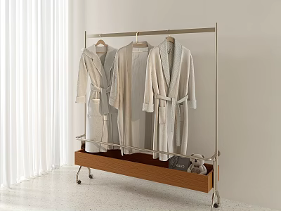 Soft Lightweight Robes Hanging on Metal Clothing Rack with Wooden Shelf and Plush Toy 3d model