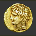 Ancient Gold Coin Featuring Head With Curly Hair Headdress And Golden Surface