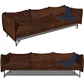 Distressed Brown Leather Three Seater Sofa With Blue Blanket And Metal Legs