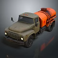 Old Style Tank Truck With Green Orange Body Vintage Design Headlights And Ladder
