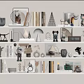 Stylish Ornament and Decor Combination With Books Sculptures Lamps And Frames On Shelves
