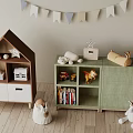 House Shaped Children's Bookshelf With Green Cabinet Toys Books And Bunting Flags On Wooden Floor