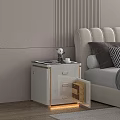 White Nightstand With Gold Accents Next To Beige Upholstered Headboard In Pink Striped Wall Bedroom