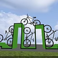 Green Arch Structures With White Bicycles On Outdoor Display Against Blue Sky And Grass