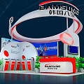 BAMSUNG Exhibition Booth With Red And White Curved Structure Display Screens And Green Plants