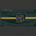 Green And Yellow Single Seat Racing Car With Streamlined Body And Rear Wing