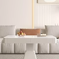 Modern White Coffee Table With Sofa Pillows Floor Lamp And Potted Plant On Wooden Floor