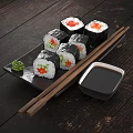 Fresh Delicious Sushi Rolls Served On Black Plate With Chopsticks Soy Sauce And Wasabi