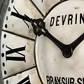 Vintage Devrine Brasur Seine Clock with White Dial and Black Roman Numerals
