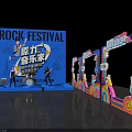 Rock Festival Stage With Band Members Playing Guitar Drums And Saxophone