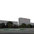 Modern Hospital Building With Glass Curtain Walls Streamlined Exterior Surrounding Lawn Trees And Entrance Area