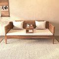 Wooden Luohan Daybed with White Cushions Small Center Table and Tea Set on Light Rug