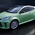 Green Sporty Two Door Car With Sleek Body Lines And Alloy Wheels