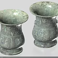 Antique Ceramic Vessels With Intricate Carvings And Classic Base Design Details