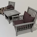 Wooden Table and Chair Set With Comfortable Dark Cushions And Cozy Throw Blanket