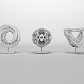 Modern White Geometric Sculptures with Intricate Hollow Patterns on Black Stands