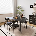 Modern Black Table and Chair Set in Bright Interior with Green Plant Wall Art Rug