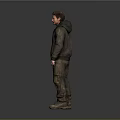 Man Wearing Brown Leather Jacket Black Hoodie And Dirty Work Pants Standing Against Gray Background