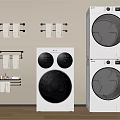 Modern White Front Loading Washing Machines In Organized Laundry Room With Towel Racks