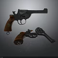 Two Different Sizes Revolvers With Metal Body And Brown Wooden Grips On Dark Background