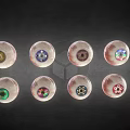 Various Colored Eyeballs With Different Styles Neatly Arranged On Dark Background