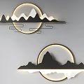 Two Piece Mountain Contour Wall Decor With Circular Illuminated Rings On Gray Wall