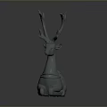 Gray Reclining Deer Sculpture With Ornate Antlers And Decorative Patterns