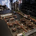 Outdoor Terrace Restaurant With City Night View String Lights And Green Plants