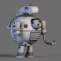 Vintage Mechanical Robot Game And Movie Character With Round Body Red Top And Yellow Eyes
