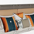 Stylish Decorative Throw Pillows With Blue Orange Beige Geometric Patterns On Bed 3d model