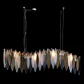 Leaf Shaped Glass And Metallic Chandelier Hanging Illuminated In Modern Interior