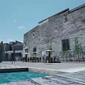 Modern Commercial Street Waterfront Pedestrian Walkway With Contemporary Architecture And Storefronts