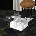 Sleek Modern Coffee Table Featuring Glass Top Marble Base And Decorative Magazines