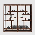 Traditional Wooden Chinese Display Shelf With Teapots And Tea Cups On Layered Shelves
