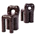Unique Brown Single Chair With Textured Glossy Finish And Hollow Structure