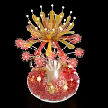 Artistic Floral Display With Red Yellow Decorative Flowers And Ornamental Balls In Vase