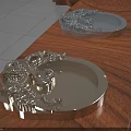 Silver Metal Trays With Intricate Dragon Designs Placed On Wooden Table Surface