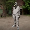 Post Apocalyptic Game Character Wearing Gas Mask And Protective Suit In Abandoned Area With Trees