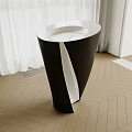 Modern Black and White Washbasin with Unique Shape on Herringbone Wooden Floor