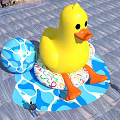 Outdoor Photo Spot with Giant Yellow Inflatable Duck and Colorful Rings Near Modern Buildings