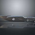 Sharp Metal Blade Knife With Circular Holes And Patterned Handle Design
