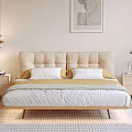 Modern Double Bed With Beige Upholstered Headboard White Pillows Yellow Blanket And Abstract Wall Art