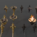 Vintage Metal Wall Sconces With Decorative Gold And Black Designs And Flame Accents