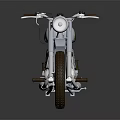 Vintage Silver Motorcycle With Black Seat Spoked Wheels And Chrome Details