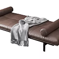 Modern Brown Leather Daybed With Metal Legs And Gray Fringed Blanket