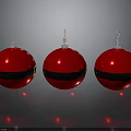 Red Christmas Ornaments With Black Stripes And Metallic Hooks On Gray Surface