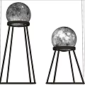 Modern Spherical Floor Lamps With Moon Textured Shades And Metal Tripod Bases