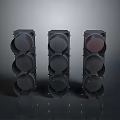 Three Traffic Lights Arrangement With Black Housing And Round Lenses