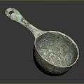 Ancient Bronze Spoon With Ornate Carved Patterns And Curved Handle Design